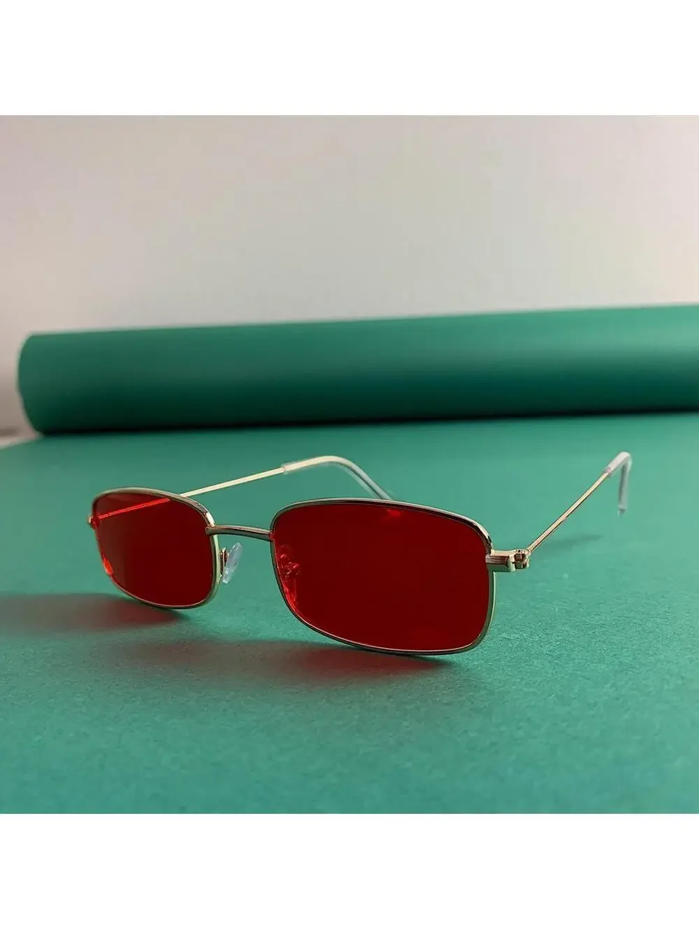 Y2k 90s 2000s vintage unique slim style gold trim sunglasses. Gold trim with